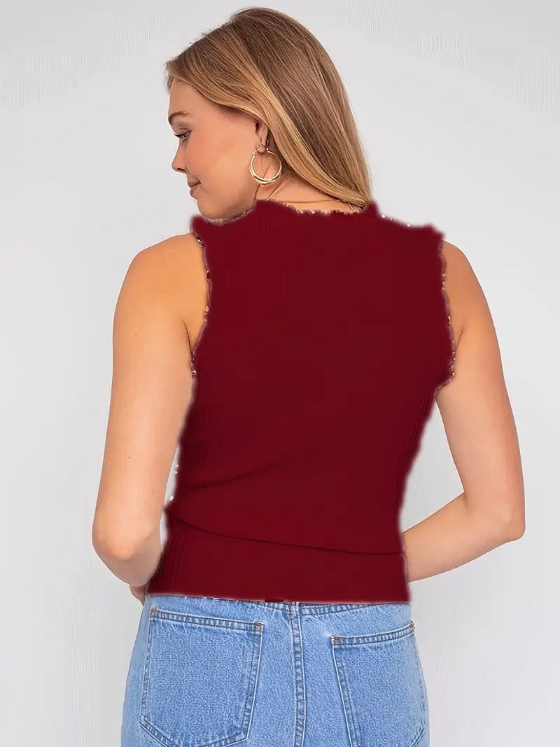 Evania – Elegancki top z falbanką i połyskiem