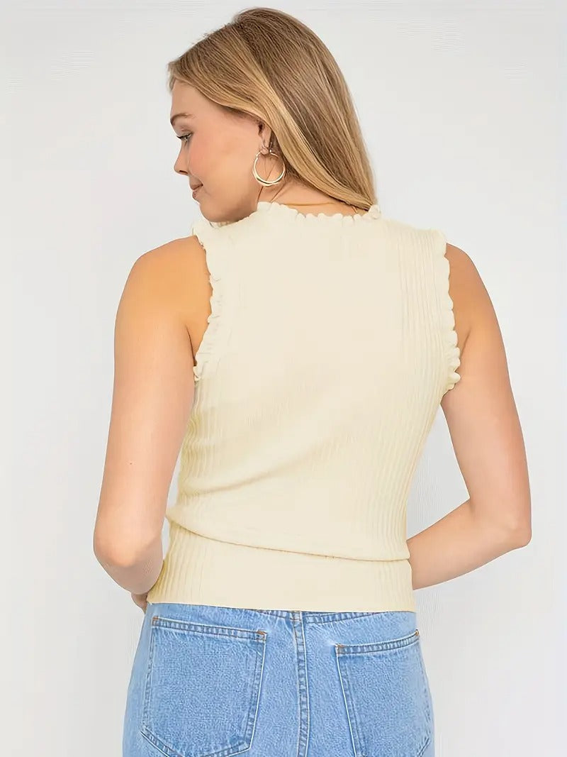 Evania – Elegancki top z falbanką i połyskiem