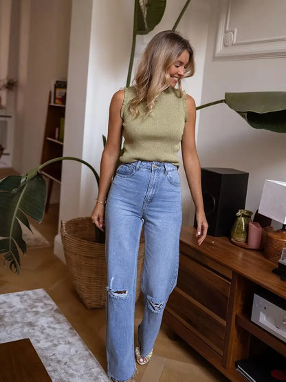 Evania – Elegancki top z falbanką i połyskiem